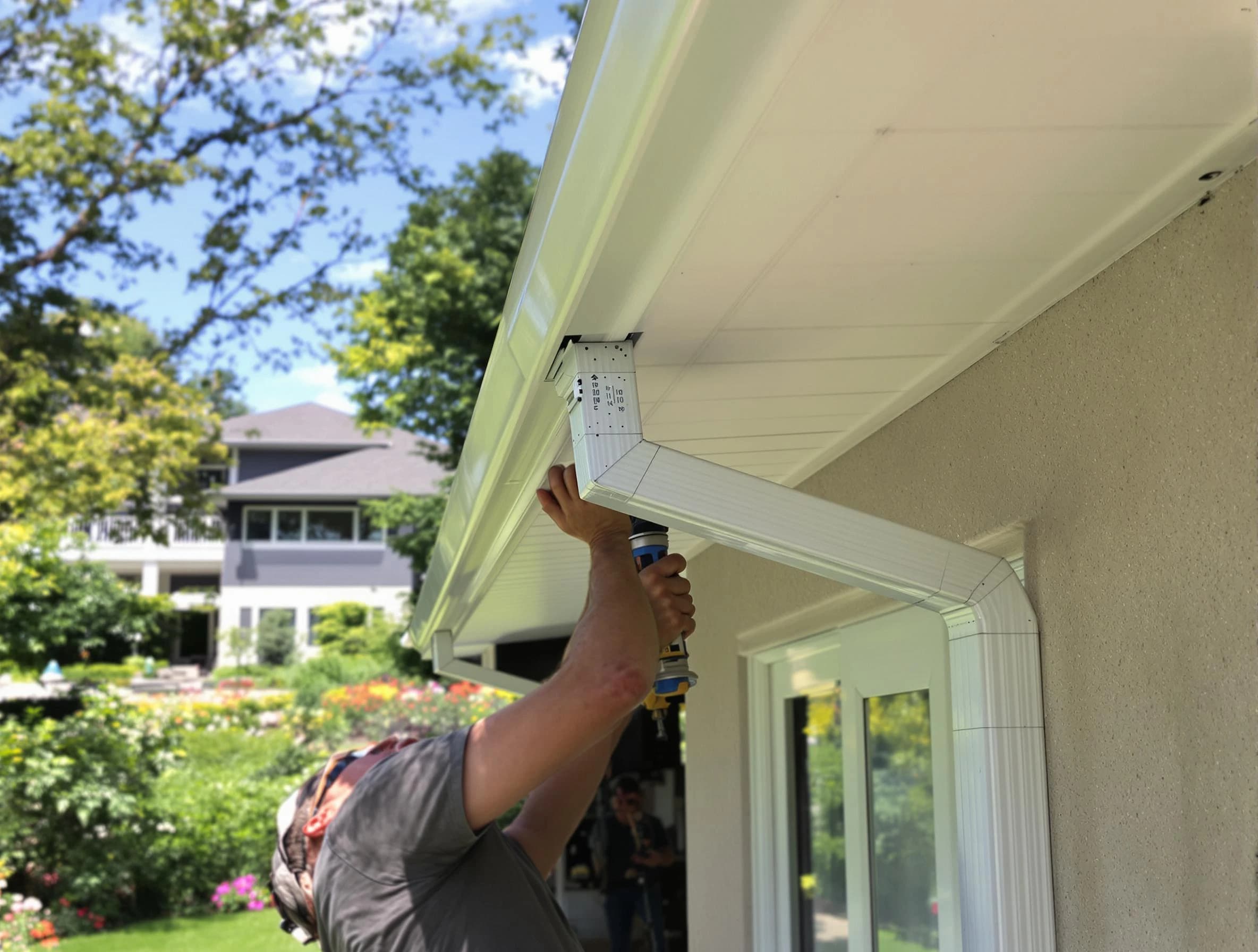 Warrensville Heights Roofing Company technicians performing gutter installation in Warrensville Heights, OH