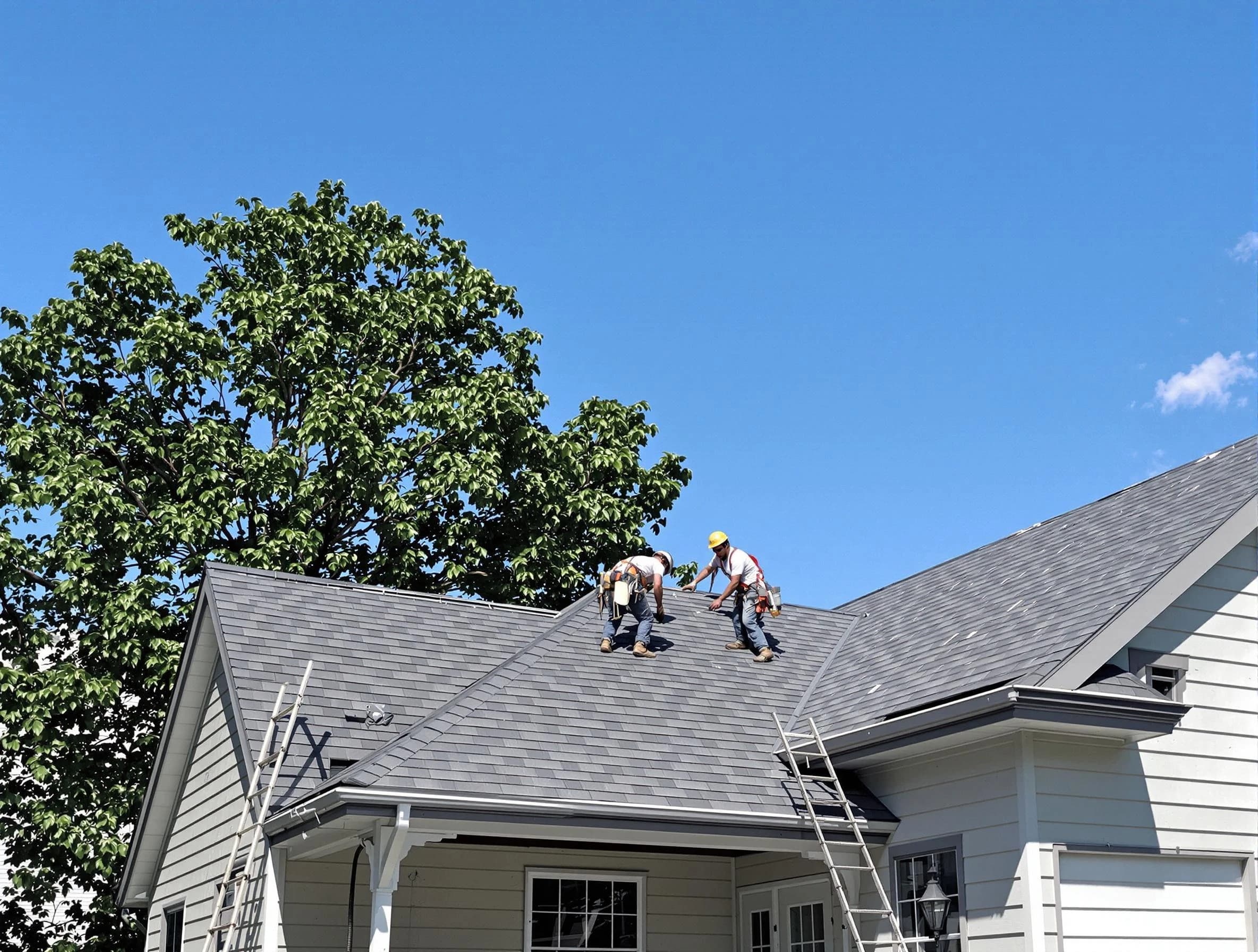 Warrensville Heights Roofing Company crew finalizing a roof installation in Warrensville Heights, OH